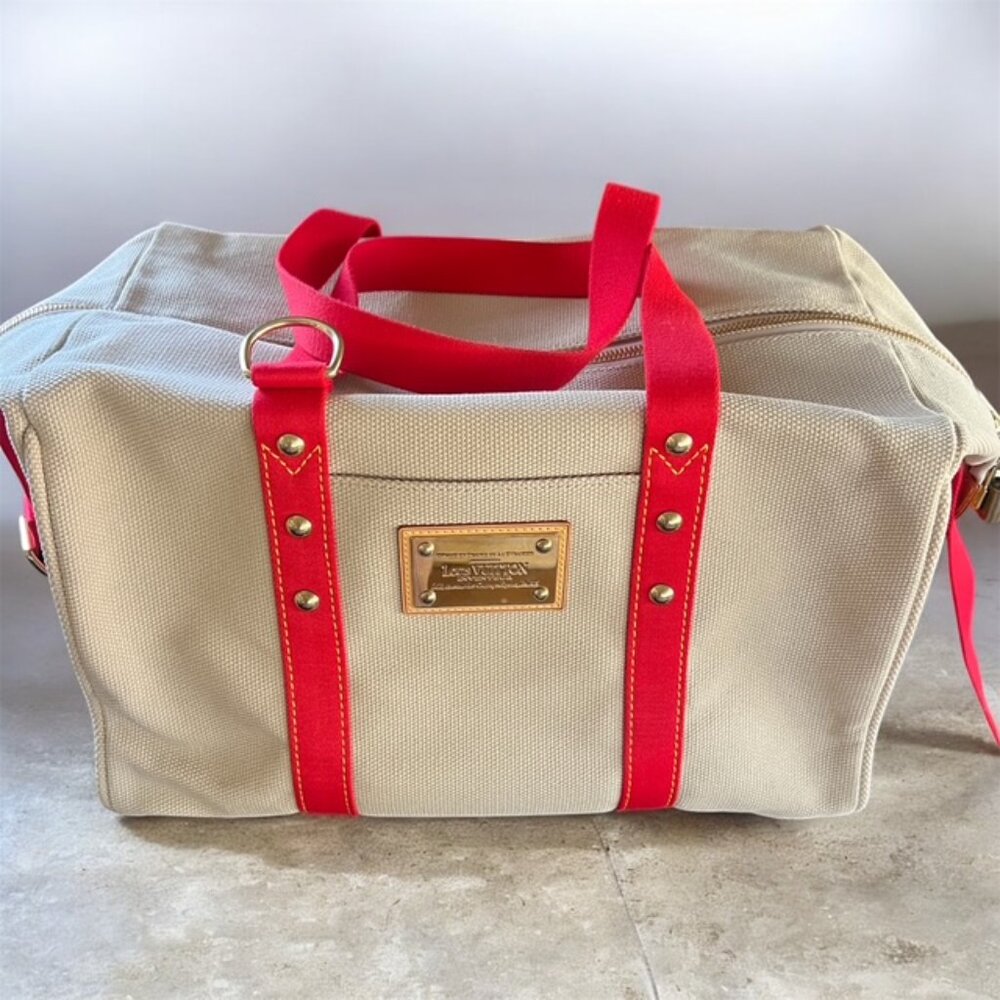 **LOCK AND KEY** LOUIS VUITTON LIMITED EDITION DUFFLE BAG